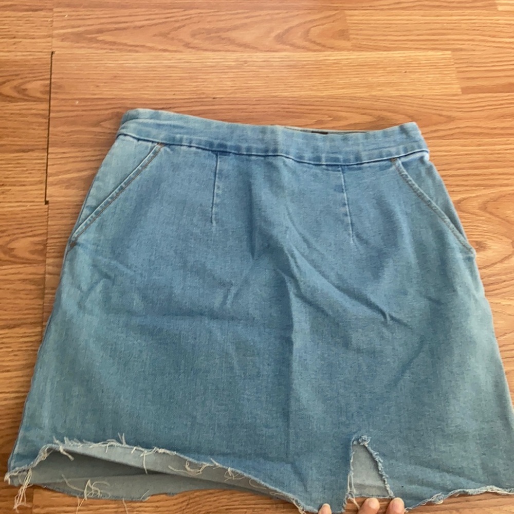 Super comfortable denim skirt with front rip slit in size M